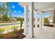Covered front porch featuring a post and beam design with landscaping at 705 Brown Creek Dr, Matthews, NC 28104