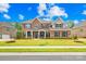 Beautiful brick home with a manicured front yard and inviting entrance at 705 Brown Creek Dr, Matthews, NC 28104