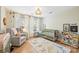 Bright Bedroom with natural light, neutral paint, and dinosaur-themed rug at 7117 Chadwyck Farms Dr, Charlotte, NC 28226