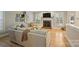 Comfortable living room featuring a fireplace and plenty of natural light at 7117 Chadwyck Farms Dr, Charlotte, NC 28226
