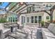 Backyard deck featuring an outdoor pergola with views of the well maintained yard at 7316 Versailles Ln, Charlotte, NC 28277