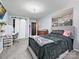 This bedroom is complete with closet doors, dark trim and light blue walls, perfect for relaxation at 8140 Laurel Run Dr, Charlotte, NC 28269