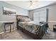 This spacious bedroom features dark wood trim, a cozy bed, and lots of natural light at 8140 Laurel Run Dr, Charlotte, NC 28269