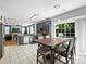 Bright kitchen features a seamless transition into the cozy living area and direct access to the outdoors at 8140 Laurel Run Dr, Charlotte, NC 28269