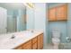 Bathroom features double sinks and updated hardware, ensuring both style and functionality at 942 Pelican Bay Dr, Pineville, NC 28134