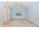 Well-lit bedroom with neutral carpet features a vaulted ceiling and fan at 942 Pelican Bay Dr, Pineville, NC 28134