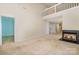 Spacious living room with fireplace, high ceilings, and access to other rooms at 942 Pelican Bay Dr, Pineville, NC 28134