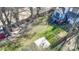 Aerial view of the home showing the backyard with deck, patio, play area, and fire pit at 1009 Leigh Ave, Charlotte, NC 28205