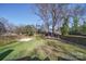 View of the backyard, which includes a fire pit and space for recreation at 1009 Leigh Ave, Charlotte, NC 28205
