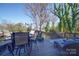 The deck has a dining area and lounge area with comfortable seating at 1009 Leigh Ave, Charlotte, NC 28205
