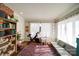 Sun-filled exercise room and playroom boasts hardwood floors and lots of natural light at 1009 Leigh Ave, Charlotte, NC 28205