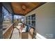 Cozy porch with a seating area and a ceiling fan at 1009 Leigh Ave, Charlotte, NC 28205