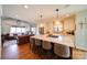 Spacious kitchen island with seating and stainless appliances, open to the living area at 1009 Leigh Ave, Charlotte, NC 28205