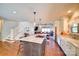 Kitchen featuring a large island with bar seating, leading into the living area at 1009 Leigh Ave, Charlotte, NC 28205