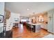 Open concept, showcasing a kitchen with a large island and stainless steel appliances at 1009 Leigh Ave, Charlotte, NC 28205