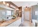 Bright bathroom featuring double sinks with granite counters, a large mirror and a tub-shower combo at 1016 Secretariat Dr, York, SC 29745