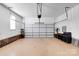 Spacious garage with high ceilings, brick accent, and ample room for parking and storage at 1016 Secretariat Dr, York, SC 29745