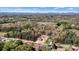 Scenic aerial view of homes surrounded by lush greenery, with the mountains visible in the background at 102 Kerda St, Taylorsville, NC 28681