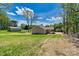 Spacious backyard with a well maintained lawn, and beautiful surrounding nature at 102 Kerda St, Taylorsville, NC 28681