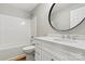 Clean bathroom featuring white cabinetry, modern fixtures, and a shower-tub combo at 102 Kerda St, Taylorsville, NC 28681