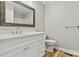 Updated bathroom with white vanity, granite counters, and modern fixtures at 102 Kerda St, Taylorsville, NC 28681