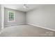 Neutral bedroom with soft carpet and a bright window at 102 Kerda St, Taylorsville, NC 28681