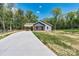 Charming single-story home with a convenient carport and a newly installed concrete driveway at 102 Kerda St, Taylorsville, NC 28681