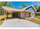 Close up of the house's carport, showcasing the home's practical covered parking and design at 102 Kerda St, Taylorsville, NC 28681