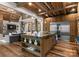Spacious kitchen with wooden cabinets, a large island and stainless steel appliances at 10723 Green Heron Ct, Charlotte, NC 28278
