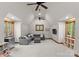 Bright living room with natural light, comfortable seating, and built-in shelving at 10723 Green Heron Ct, Charlotte, NC 28278