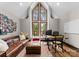 Well-lit home office with large windows and wood accents at 10723 Green Heron Ct, Charlotte, NC 28278