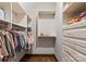 Custom closet featuring built-in shelving and hanging rods to optimize organization at 10723 Green Heron Ct, Charlotte, NC 28278
