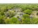 An aerial view showcases a residential area with tree-lined streets and diverse housing styles at 1113 Urban Pl, Charlotte, NC 28209
