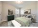 Inviting bedroom with natural light, serene artwork, and comfortable furnishings at 1153 Doris Ct, Rock Hill, SC 29730