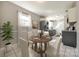 Cozy dining area with a round table, modern chairs, and natural light at 1153 Doris Ct, Rock Hill, SC 29730