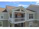 Balcony featuring outdoor seating, creating an inviting space for relaxation and enjoying views at 1211 Torrence Cir, Davidson, NC 28036