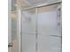 A shower stall with a frosted glass door at 1211 Torrence Cir, Davidson, NC 28036