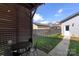 Covered back patio with outdoor dining area and view of fenced yard at 13813 Jacks Ln, Pineville, NC 28134