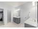 Bathroom featuring double sinks with grey cabinets at 13813 Jacks Ln, Pineville, NC 28134
