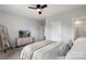 Bedroom with mounted TV and neutral decor at 13813 Jacks Ln, Pineville, NC 28134