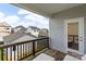 Outdoor deck with wood railing offering neighborhood views at 13813 Jacks Ln, Pineville, NC 28134