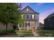 Charming two-story home featuring a welcoming front porch, landscaped lawn, and a classic design at 13813 Jacks Ln, Pineville, NC 28134
