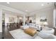 Open living space with hardwood floors that transitions to the dining and kitchen at 13813 Jacks Ln, Pineville, NC 28134