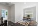 Bright office space with a desk, a chair, and plenty of natural light at 13813 Jacks Ln, Pineville, NC 28134