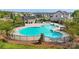 Beautiful community pool with ample seating and a beach-style entry at 13813 Jacks Ln, Pineville, NC 28134