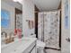 This bathroom features a single sink vanity and shower at 140 Wandering Ln, Bessemer City, NC 28016
