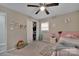 This bedroom features a ceiling fan, closet, and a comfy pink bed at 140 Wandering Ln, Bessemer City, NC 28016
