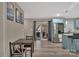 Open concept kitchen with a dining area and stainless steel refrigerator at 140 Wandering Ln, Bessemer City, NC 28016
