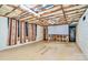 Utility basement with exposed beams, insulation, and water heater at 1409 Sherwood Dr, Kannapolis, NC 28081