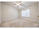 Comfortable bedroom with carpet, natural light from a window, and ceiling fan at 1581 Arborgate Dr, Rock Hill, SC 29732